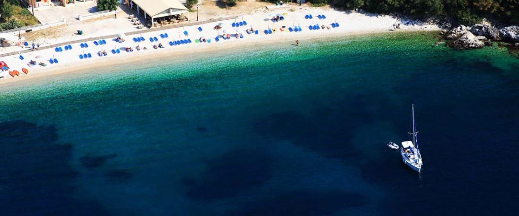 kalami corfu beach coast rent a boat ride with a boat rocky hills blue sea activities summer sun holidays